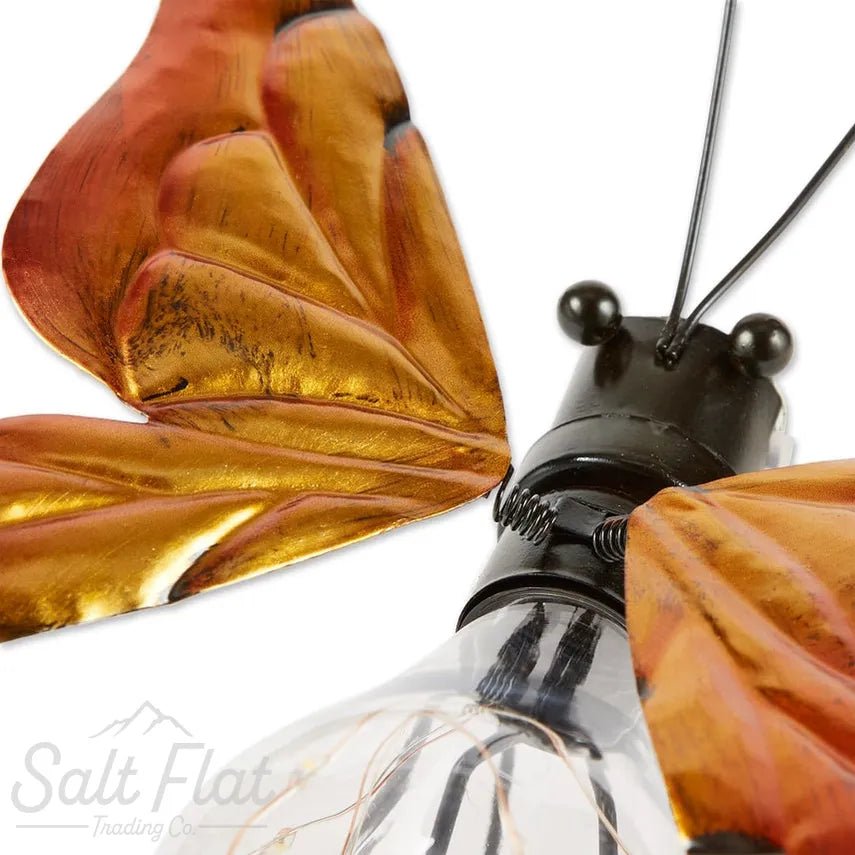 Insecto solar luminoso de mariposa