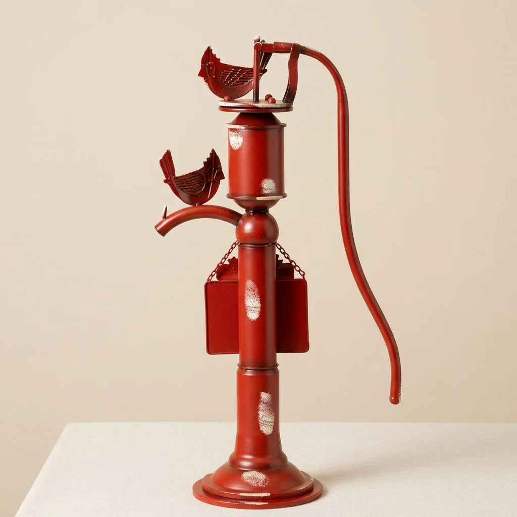 Old Style Red Iron Water Pump with "Merry Christmas" Sign